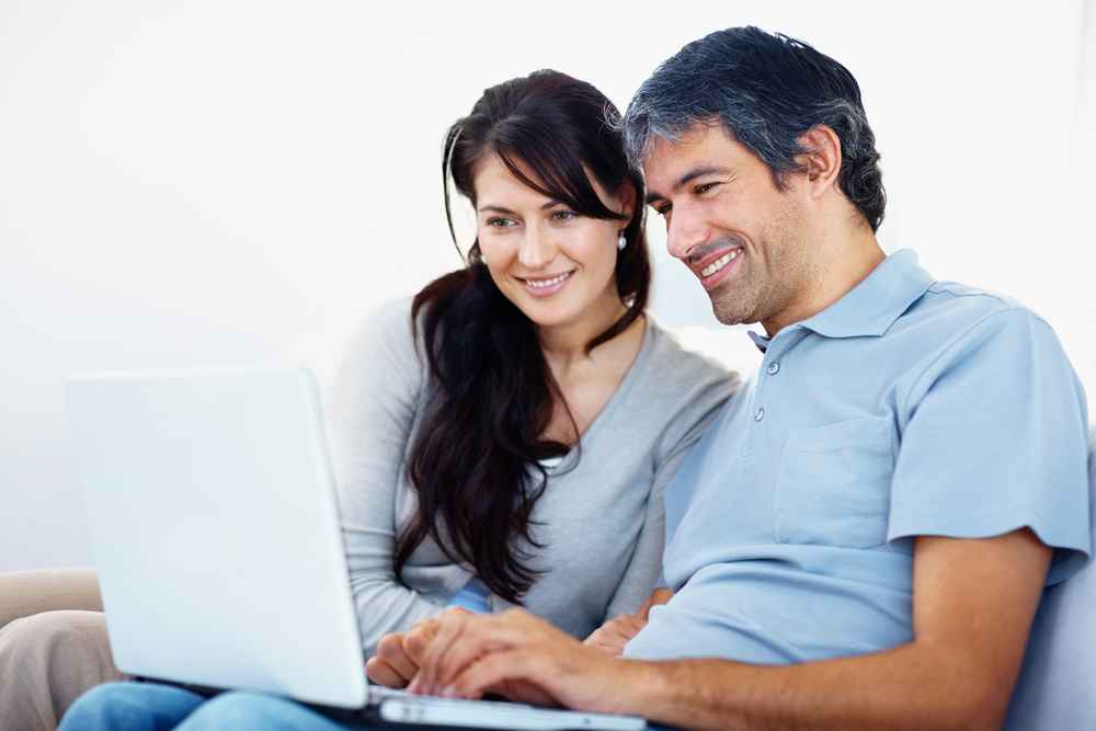 Couple using Laptop